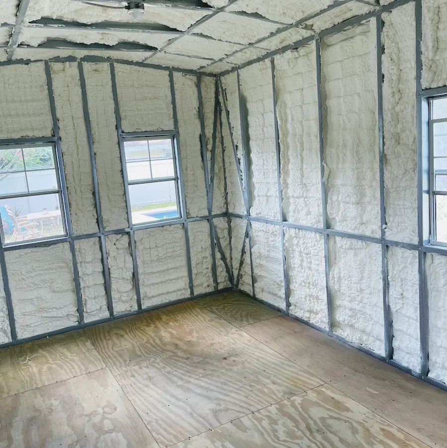 Closed-cell spray foam insulation applied to wall cavities in a residential project in Galena Park